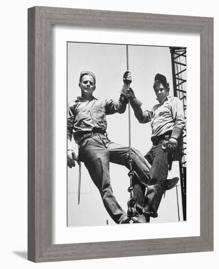 Construction Workers Standing on a Wreaking Ball-Ralph Crane-Framed Photographic Print