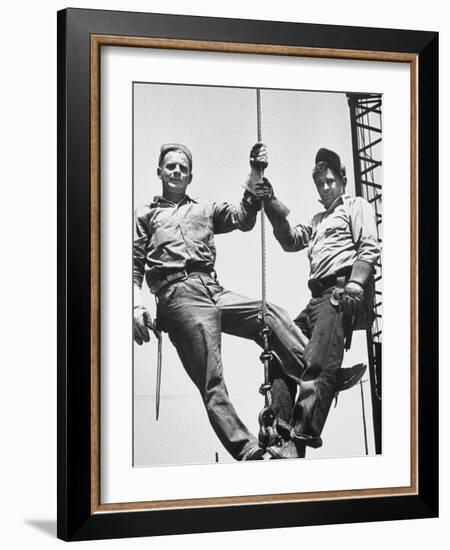 Construction Workers Standing on a Wreaking Ball-Ralph Crane-Framed Photographic Print