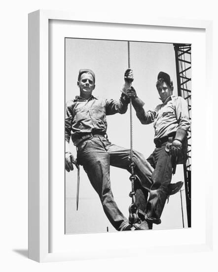 Construction Workers Standing on a Wreaking Ball-Ralph Crane-Framed Photographic Print