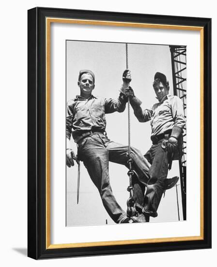 Construction Workers Standing on a Wreaking Ball-Ralph Crane-Framed Photographic Print