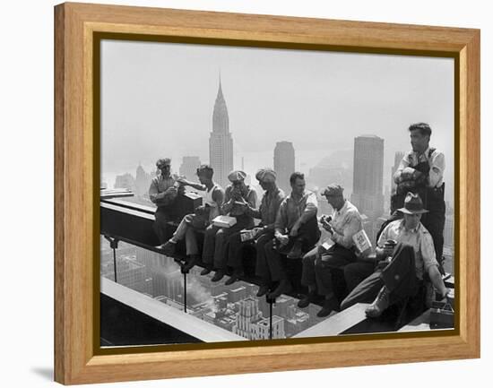 Construction Workers Take a Lunch Break on a Steel Beam Atop the RCA Building at Rockefeller Center-null-Framed Premier Image Canvas