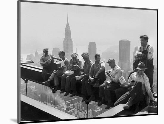 Construction Workers Take a Lunch Break on a Steel Beam Atop the RCA Building at Rockefeller Center-null-Mounted Photographic Print