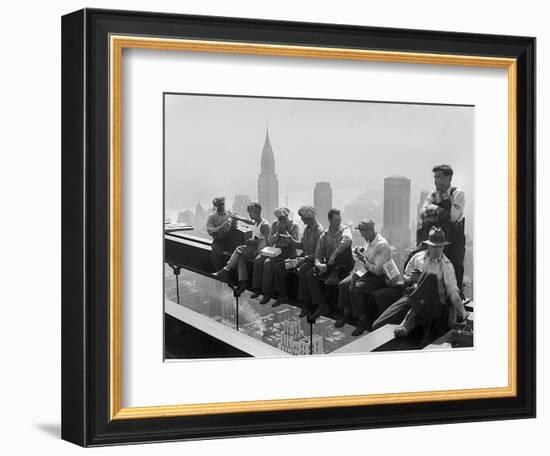 Construction Workers Take a Lunch Break on a Steel Beam Atop the RCA Building at Rockefeller Center-null-Framed Photographic Print