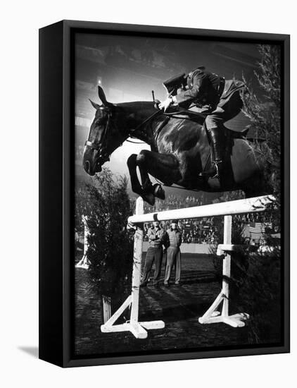 Contestant Jumping at the National Horse Show at Madison Square Garden-Gjon Mili-Framed Premier Image Canvas