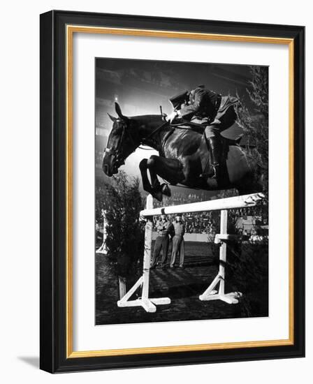 Contestant Jumping at the National Horse Show at Madison Square Garden-Gjon Mili-Framed Photographic Print