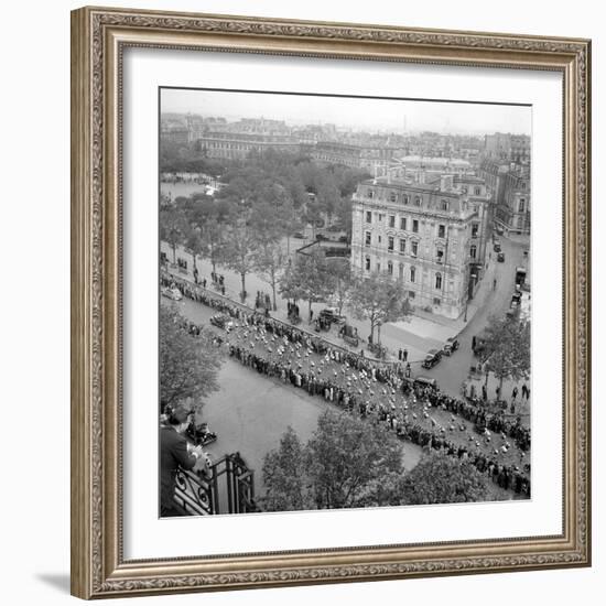 Contestants in the 1948 Tour De France Parade up the Champs Elysees-null-Framed Photographic Print