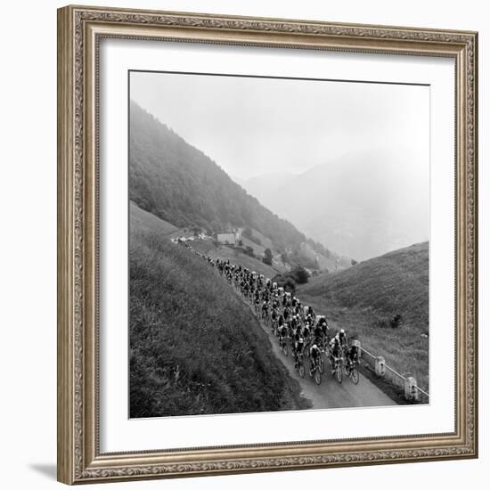 Contestants in the Grueling Tour De France are Seen on Their Way to the Mente Pass--Framed Photographic Print