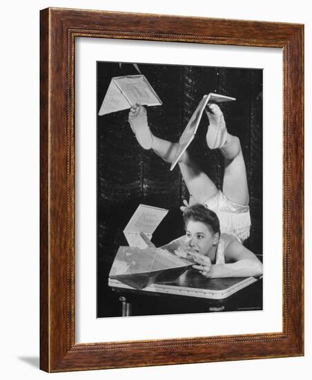 Contortionist Assembling a Dymaxion Map-Wallace Kirkland-Framed Photographic Print