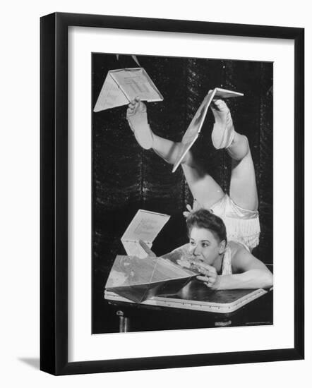 Contortionist Assembling a Dymaxion Map-Wallace Kirkland-Framed Photographic Print