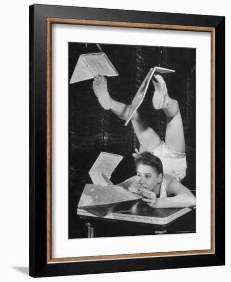 Contortionist Assembling a Dymaxion Map-Wallace Kirkland-Framed Photographic Print