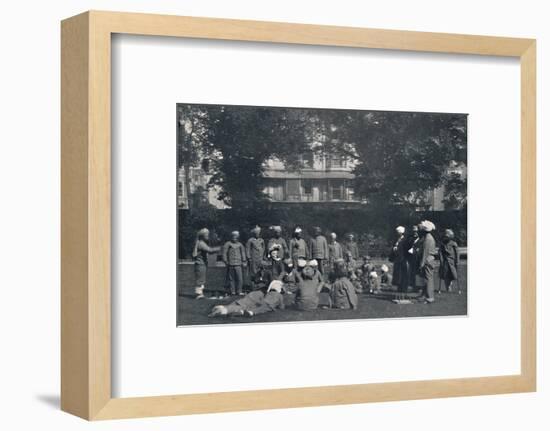 'Convalescent Indian Soldiers Playing Quoits on the Eastern Lawns', c1915, (1939)-Unknown-Framed Photographic Print