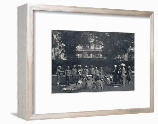 'Convalescent Indian Soldiers Playing Quoits on the Eastern Lawns', c1915, (1939)-Unknown-Framed Photographic Print