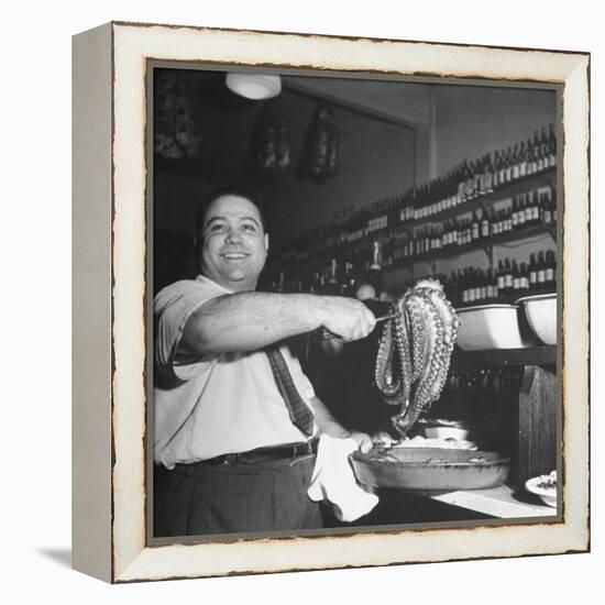 Cook in the Napoli Restaurant Holding up an Octopus, a Delicacy in Argentina-Thomas D^ Mcavoy-Framed Premier Image Canvas
