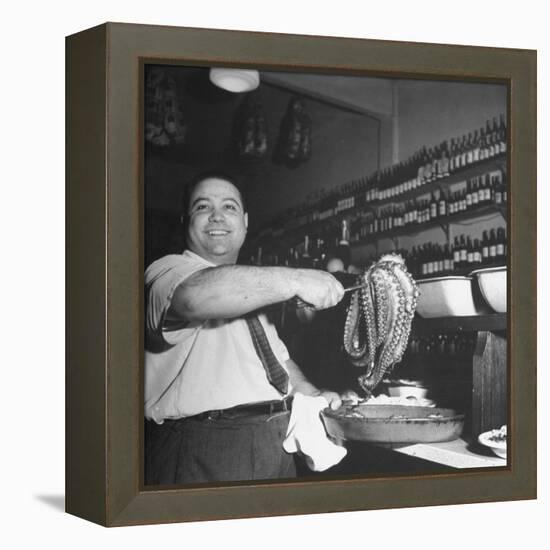 Cook in the Napoli Restaurant Holding up an Octopus, a Delicacy in Argentina-Thomas D^ Mcavoy-Framed Premier Image Canvas