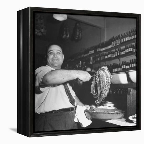 Cook in the Napoli Restaurant Holding up an Octopus, a Delicacy in Argentina-Thomas D^ Mcavoy-Framed Premier Image Canvas