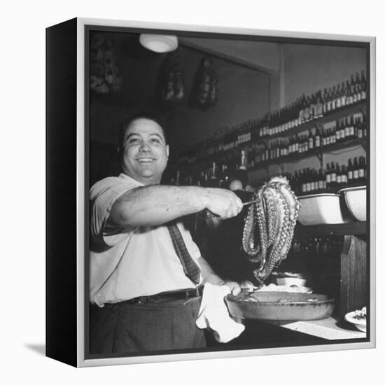 Cook in the Napoli Restaurant Holding up an Octopus, a Delicacy in Argentina-Thomas D^ Mcavoy-Framed Premier Image Canvas