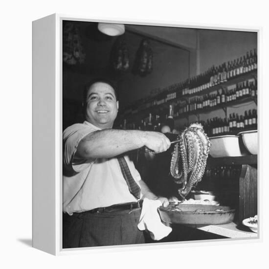 Cook in the Napoli Restaurant Holding up an Octopus, a Delicacy in Argentina-Thomas D^ Mcavoy-Framed Premier Image Canvas