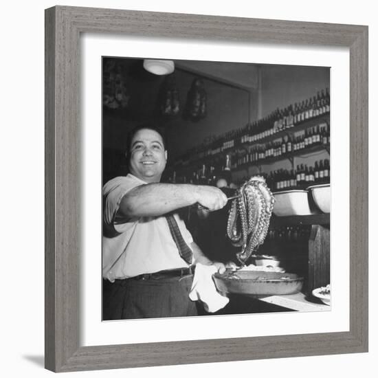 Cook in the Napoli Restaurant Holding up an Octopus, a Delicacy in Argentina-Thomas D^ Mcavoy-Framed Photographic Print
