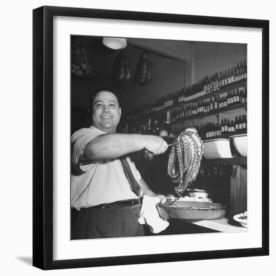 Cook in the Napoli Restaurant Holding up an Octopus, a Delicacy in Argentina-Thomas D^ Mcavoy-Framed Photographic Print