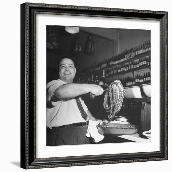 Cook in the Napoli Restaurant Holding up an Octopus, a Delicacy in Argentina-Thomas D^ Mcavoy-Framed Photographic Print