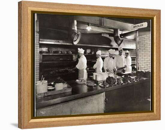 Cooks at the Broiler in the Kitchen of the Hotel Commodore, 1919-Byron Company-Framed Premier Image Canvas