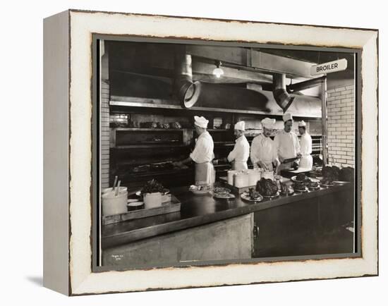 Cooks at the Broiler in the Kitchen of the Hotel Commodore, 1919-Byron Company-Framed Premier Image Canvas