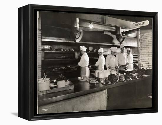 Cooks at the Broiler in the Kitchen of the Hotel Commodore, 1919-Byron Company-Framed Premier Image Canvas