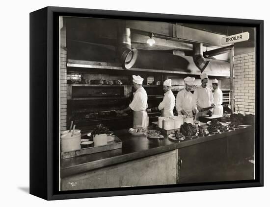 Cooks at the Broiler in the Kitchen of the Hotel Commodore, 1919-Byron Company-Framed Premier Image Canvas