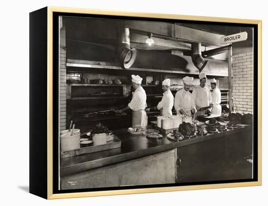 Cooks at the Broiler in the Kitchen of the Hotel Commodore, 1919-Byron Company-Framed Premier Image Canvas