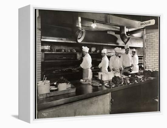 Cooks at the Broiler in the Kitchen of the Hotel Commodore, 1919-Byron Company-Framed Premier Image Canvas