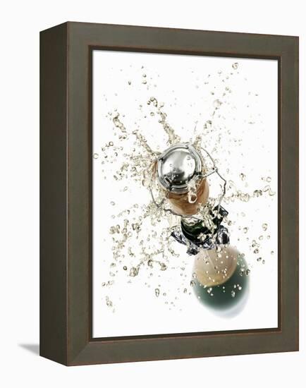 Cork Flying Out of a Sparkling Wine Bottle-Kröger & Gross-Framed Premier Image Canvas