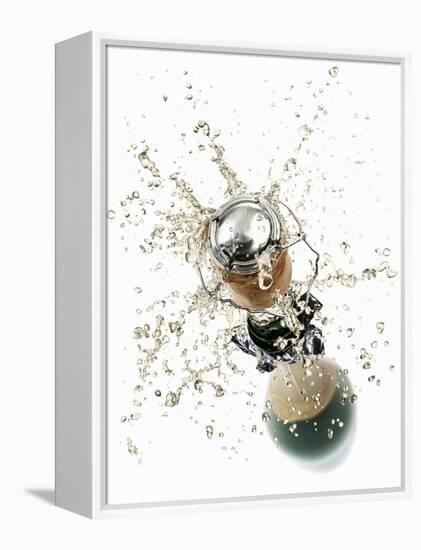 Cork Flying Out of a Sparkling Wine Bottle-Kröger & Gross-Framed Premier Image Canvas