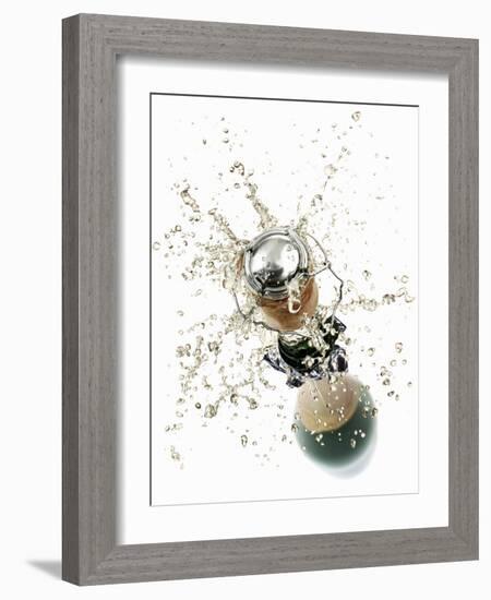 Cork Flying Out of a Sparkling Wine Bottle-Kröger & Gross-Framed Photographic Print