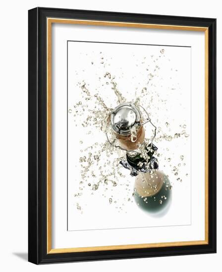 Cork Flying Out of a Sparkling Wine Bottle-Kröger & Gross-Framed Photographic Print