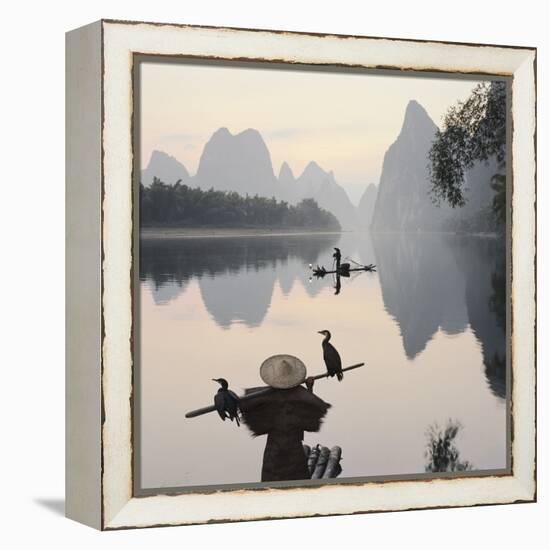 Cormorant fishermen in Li River-Martin Puddy-Framed Premier Image Canvas