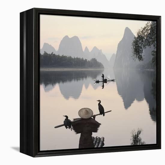 Cormorant fishermen in Li River-Martin Puddy-Framed Premier Image Canvas