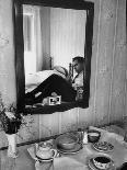 Vice Presidential Candidate Richard M. Nixon Sitting on His Hotel Bed Reviewing Paperwork-Cornell Capa-Photographic Print