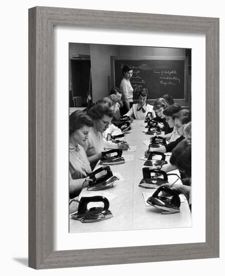 Cornell's Home Economics students learn different elements of irons and proper maintenance of it-Nina Leen-Framed Photographic Print