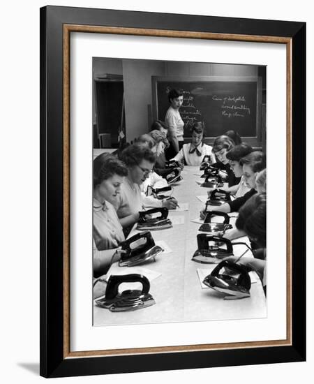 Cornell's Home Economics students learn different elements of irons and proper maintenance of it-Nina Leen-Framed Photographic Print