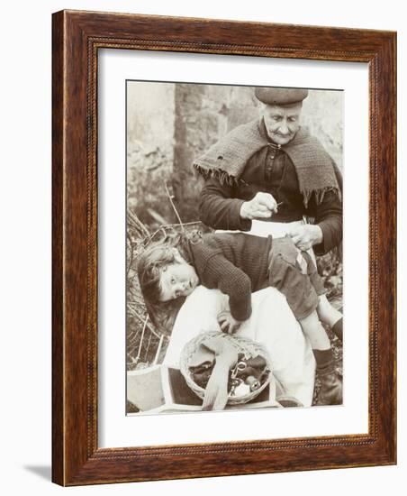 Cornish Grandmother Repairs Her Grandson's Clothing-null-Framed Photographic Print