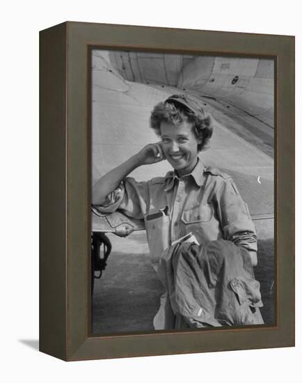 Correspondent Marguerite Higgins Smiling, Leaning Against Airplane-Carl Mydans-Framed Premier Image Canvas