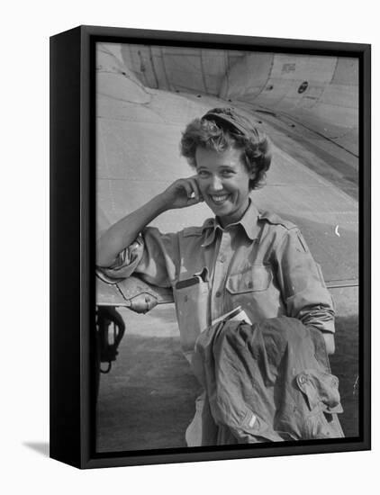 Correspondent Marguerite Higgins Smiling, Leaning Against Airplane-Carl Mydans-Framed Premier Image Canvas