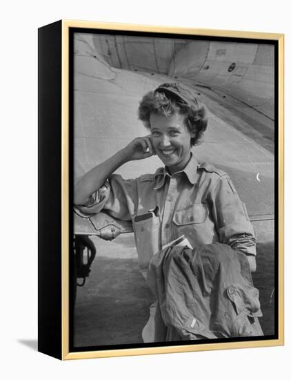 Correspondent Marguerite Higgins Smiling, Leaning Against Airplane-Carl Mydans-Framed Premier Image Canvas
