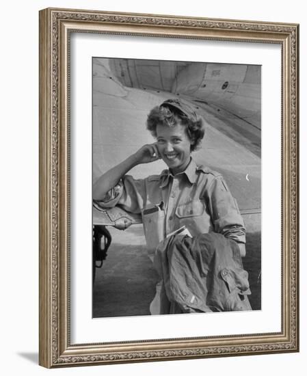 Correspondent Marguerite Higgins Smiling, Leaning Against Airplane-Carl Mydans-Framed Photographic Print