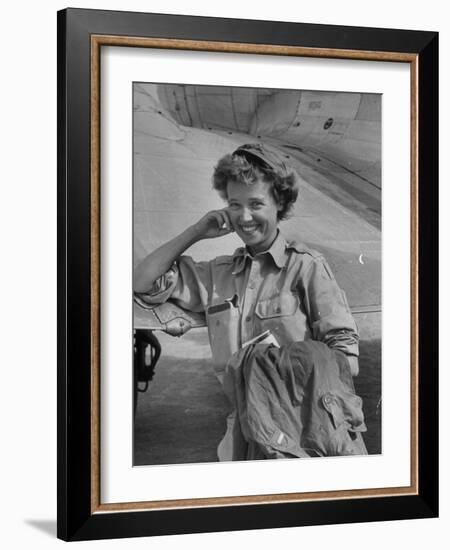 Correspondent Marguerite Higgins Smiling, Leaning Against Airplane-Carl Mydans-Framed Photographic Print