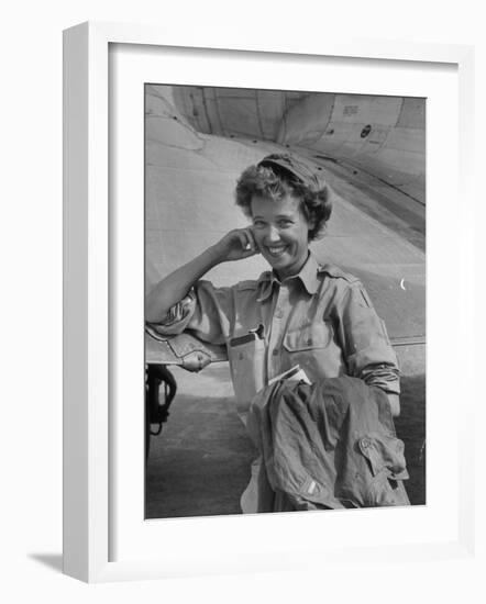 Correspondent Marguerite Higgins Smiling, Leaning Against Airplane-Carl Mydans-Framed Photographic Print