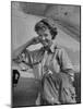 Correspondent Marguerite Higgins Smiling, Leaning Against Airplane-Carl Mydans-Mounted Photographic Print