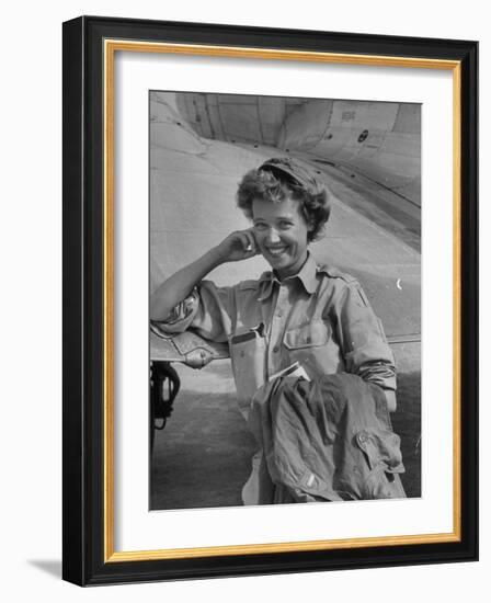 Correspondent Marguerite Higgins Smiling, Leaning Against Airplane-Carl Mydans-Framed Photographic Print