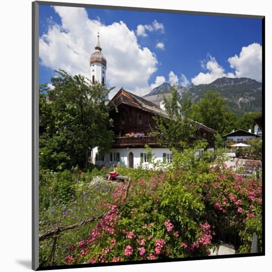 Cottage Garden at Polznkaspar House with Parish Church of St. Martin-null-Mounted Art Print