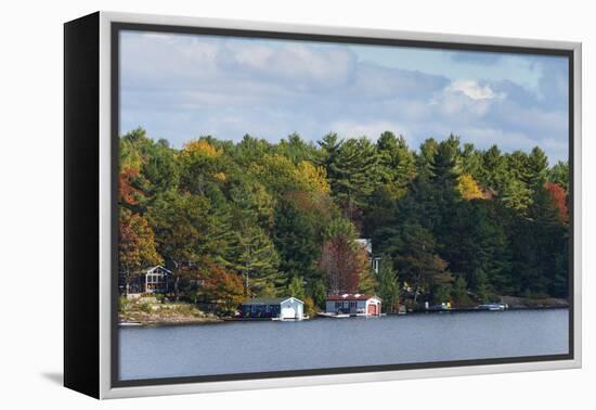 Cottages and boathouses at lakeside, Lake Muskoka, Ontario, Canada-Panoramic Images-Framed Premier Image Canvas